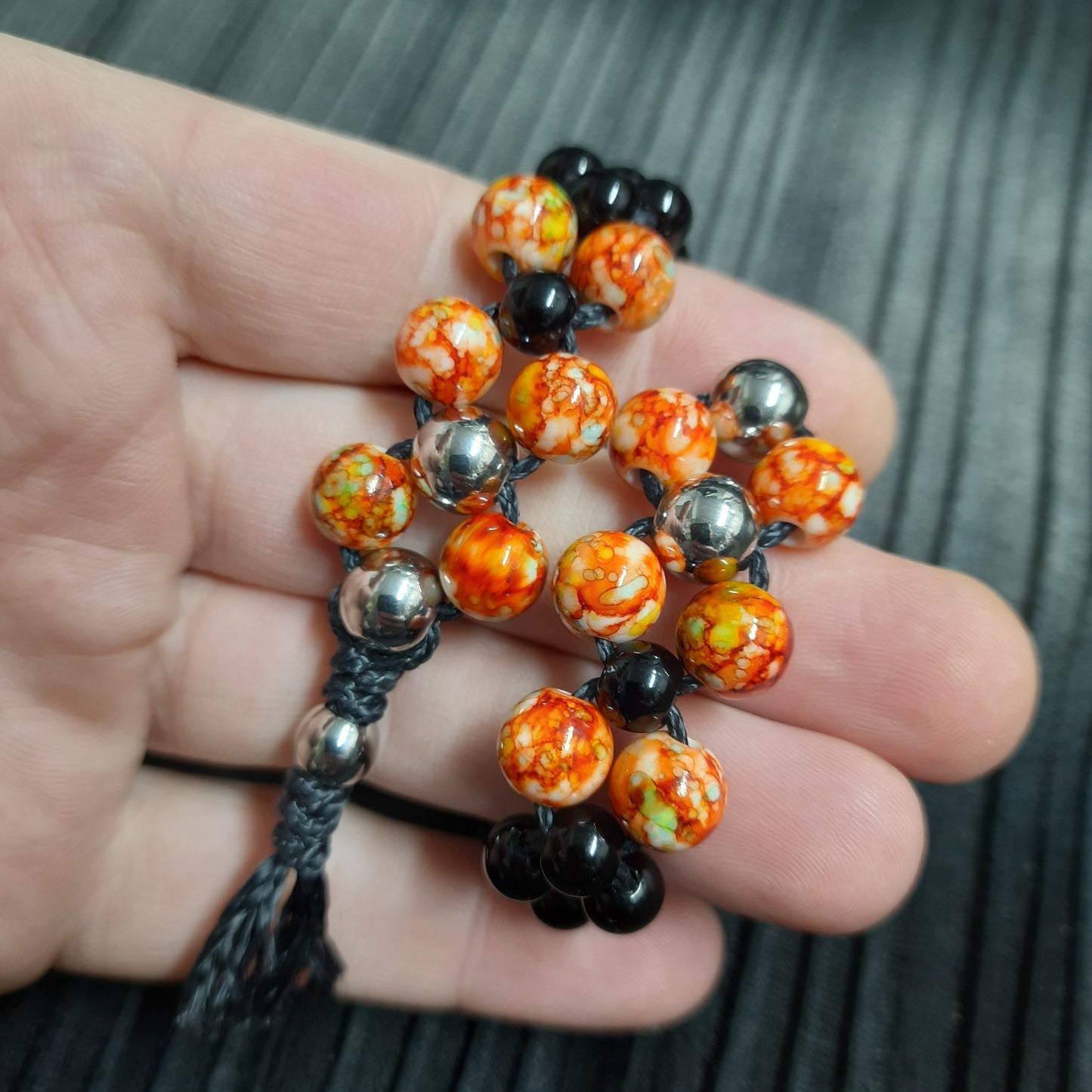 Chetki "Orange and black reptile" (SCU: 250214-2)