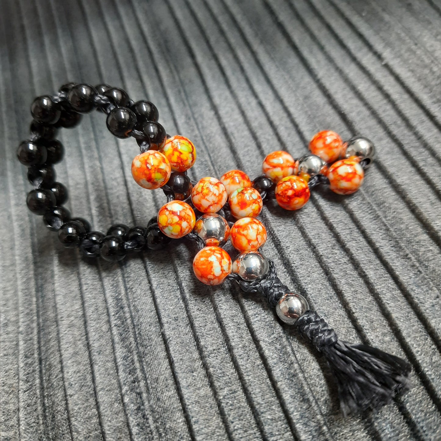 Chetki "Orange and black reptile" (SCU: 250214-2)