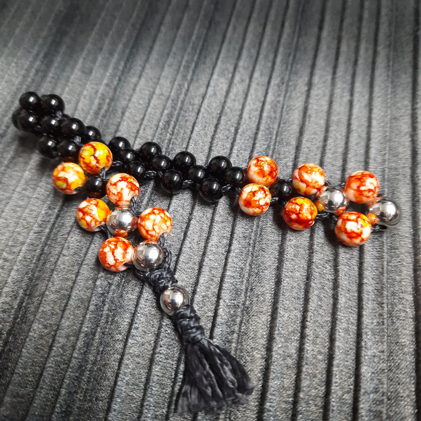 Chetki "Orange and black reptile" (SCU: 250214-2)