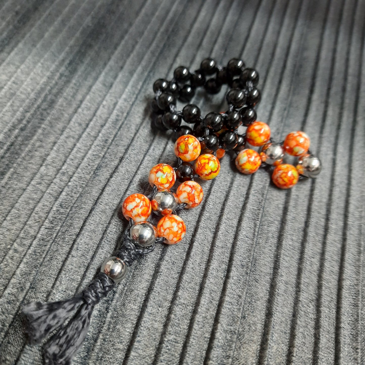 Chetki "Orange and black reptile" (SCU: 250214-2)