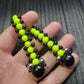 Handmade flip rosary (chetki), assembled from round plastic beads. The chotki has good flexibility thanks to the silicone cord. This fidget is used as an anti-stress, skill toy, stylish accessory and collectible.