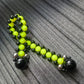 Handmade flip rosary (chetki), assembled from round plastic beads. The chotki has good flexibility thanks to the silicone cord. This fidget is used as an anti-stress, skill toy, stylish accessory and collectible.