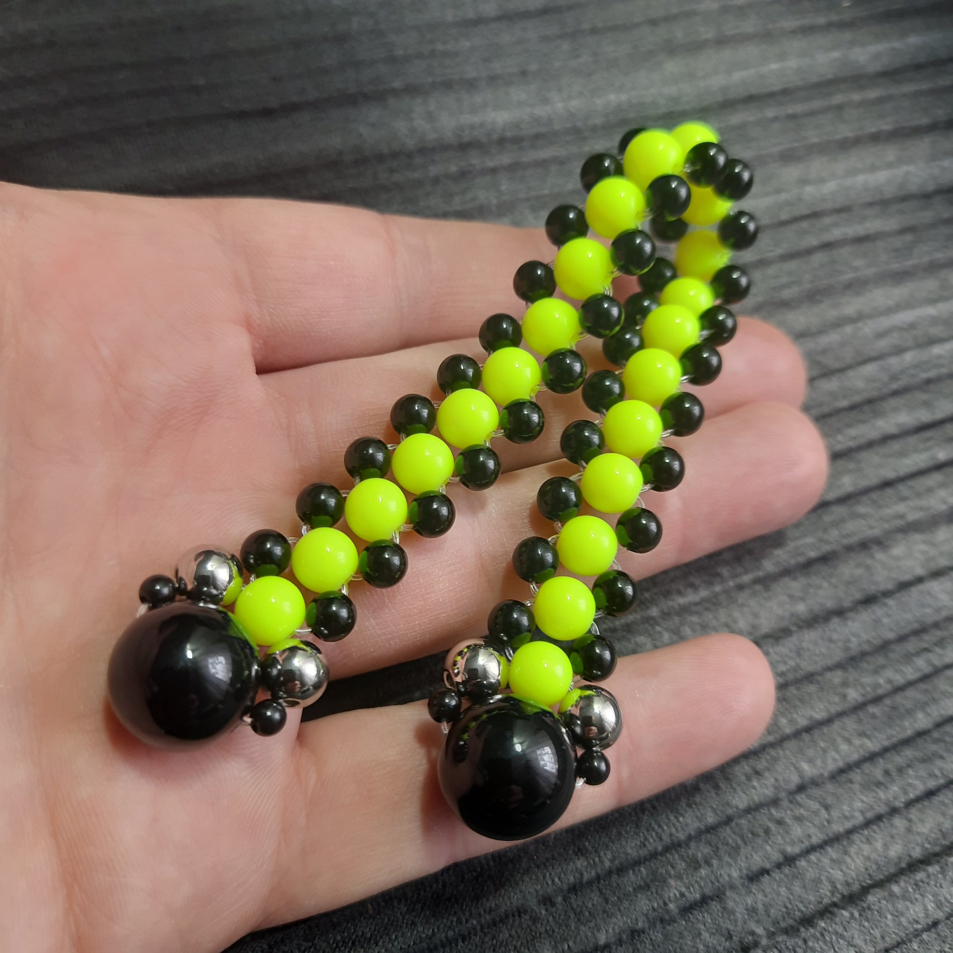 Handmade flip rosary (chetki), assembled from round plastic beads. The chotki has good flexibility thanks to the silicone cord. This fidget is used as an anti-stress, skill toy, stylish accessory and collectible.