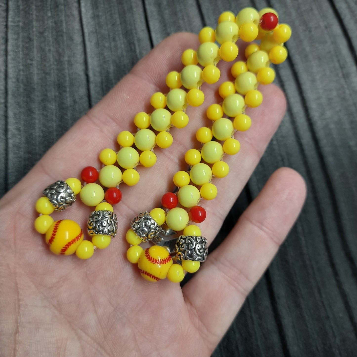 Handmade flip rosary (chetki), assembled from round plastic beads. The chotki has good flexibility thanks to the silicone cord. This fidget is used as an anti-stress, skill toy, stylish accessory and collectible.