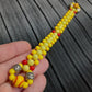 Handmade flip rosary (chetki), assembled from round plastic beads. The chotki has good flexibility thanks to the silicone cord. This fidget is used as an anti-stress, skill toy, stylish accessory and collectible.