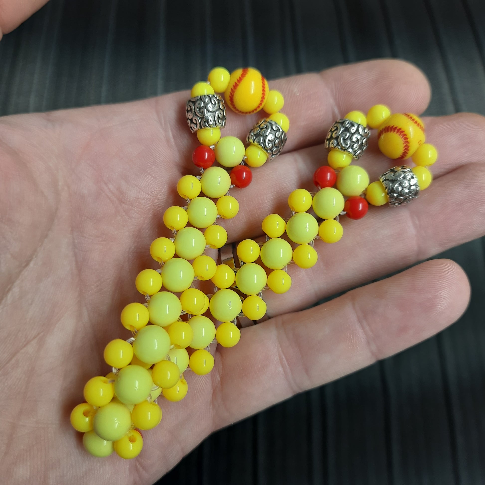 Handmade flip rosary (chetki), assembled from round plastic beads. The chotki has good flexibility thanks to the silicone cord. This fidget is used as an anti-stress, skill toy, stylish accessory and collectible.