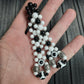 Handmade flip rosary (chetki), assembled from round plastic beads. The chotki has good flexibility thanks to the silicone cord. This fidget is used as an anti-stress, skill toy, stylish accessory and collectible.