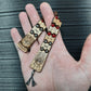 Wooden flat flip-over rosary (chetki) with a pattern applied using pyrography. Handmade rosary. Kevlar cord is used.