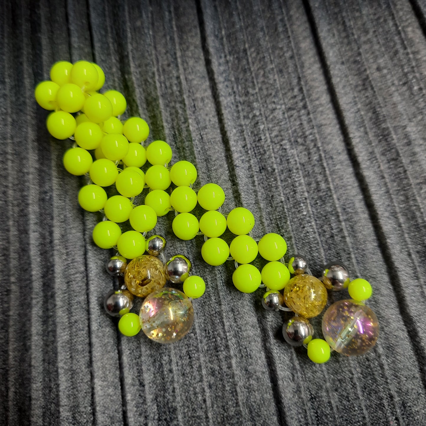 Handmade flip rosary (chetki), assembled from round plastic beads. The chotki has good flexibility thanks to the silicone cord. This fidget is used as an anti-stress, skill toy, stylish accessory and collectible.