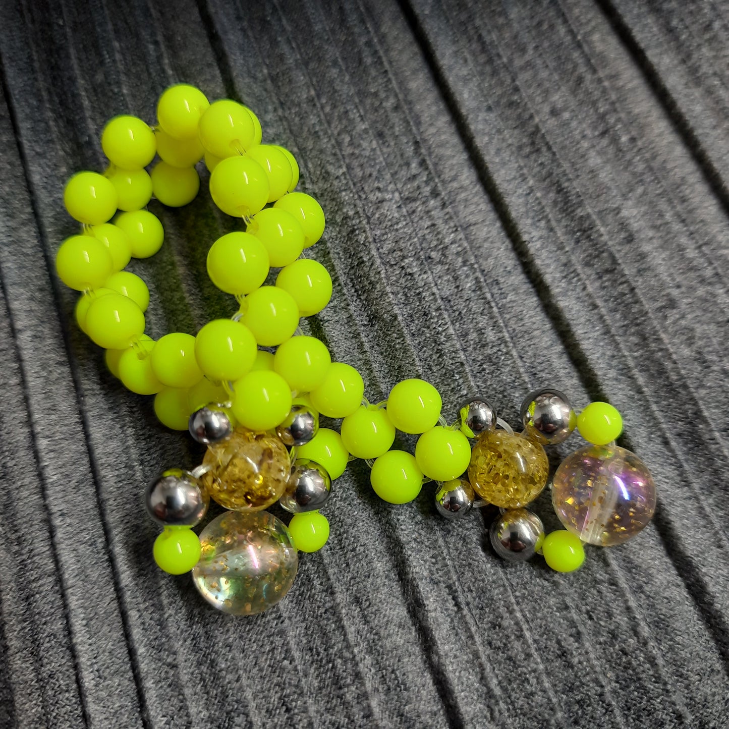 Handmade flip rosary (chetki), assembled from round plastic beads. The chotki has good flexibility thanks to the silicone cord. This fidget is used as an anti-stress, skill toy, stylish accessory and collectible.