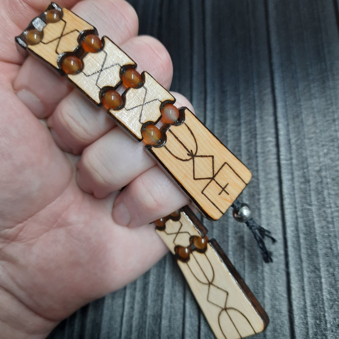 Wooden flat flip-over rosary (chetki) with a pattern applied using pyrography. Handmade. Kevlar cord is used.