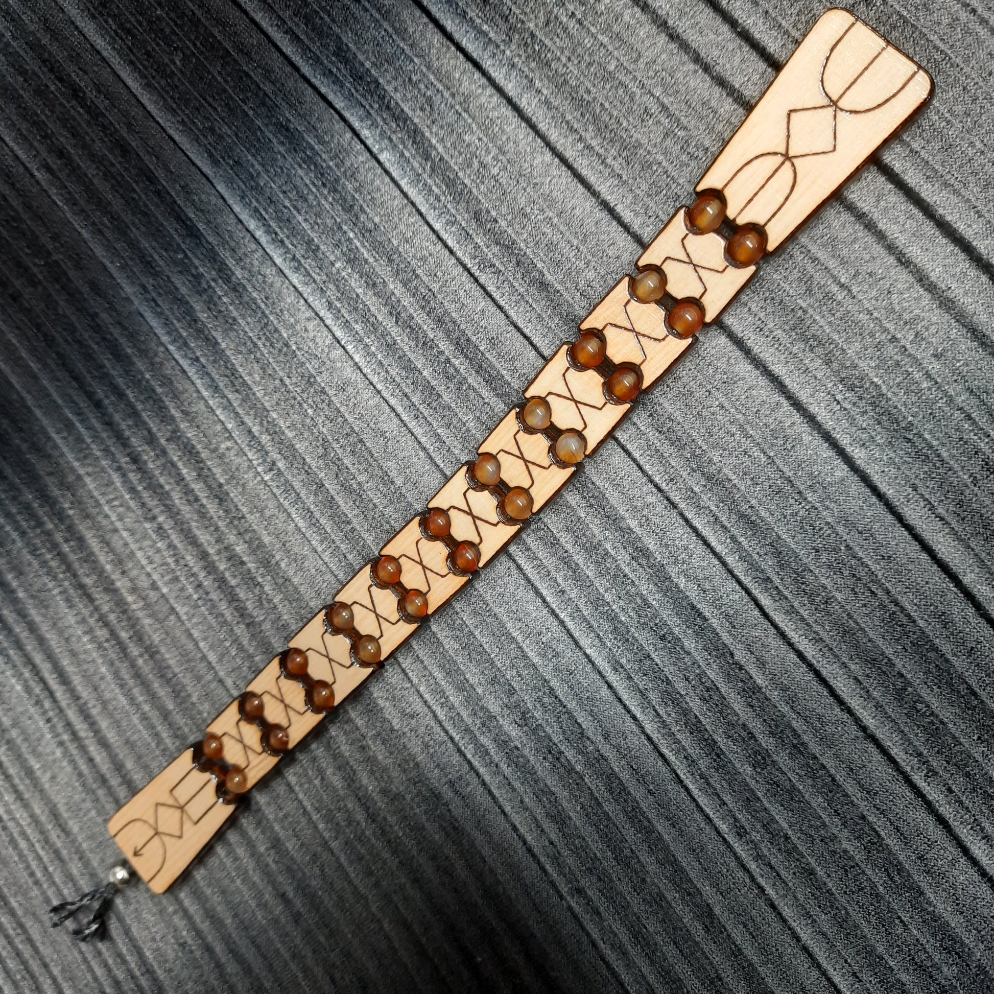 Wooden flat flip-over rosary (chetki) with a pattern applied using pyrography. Handmade. Kevlar cord is used.