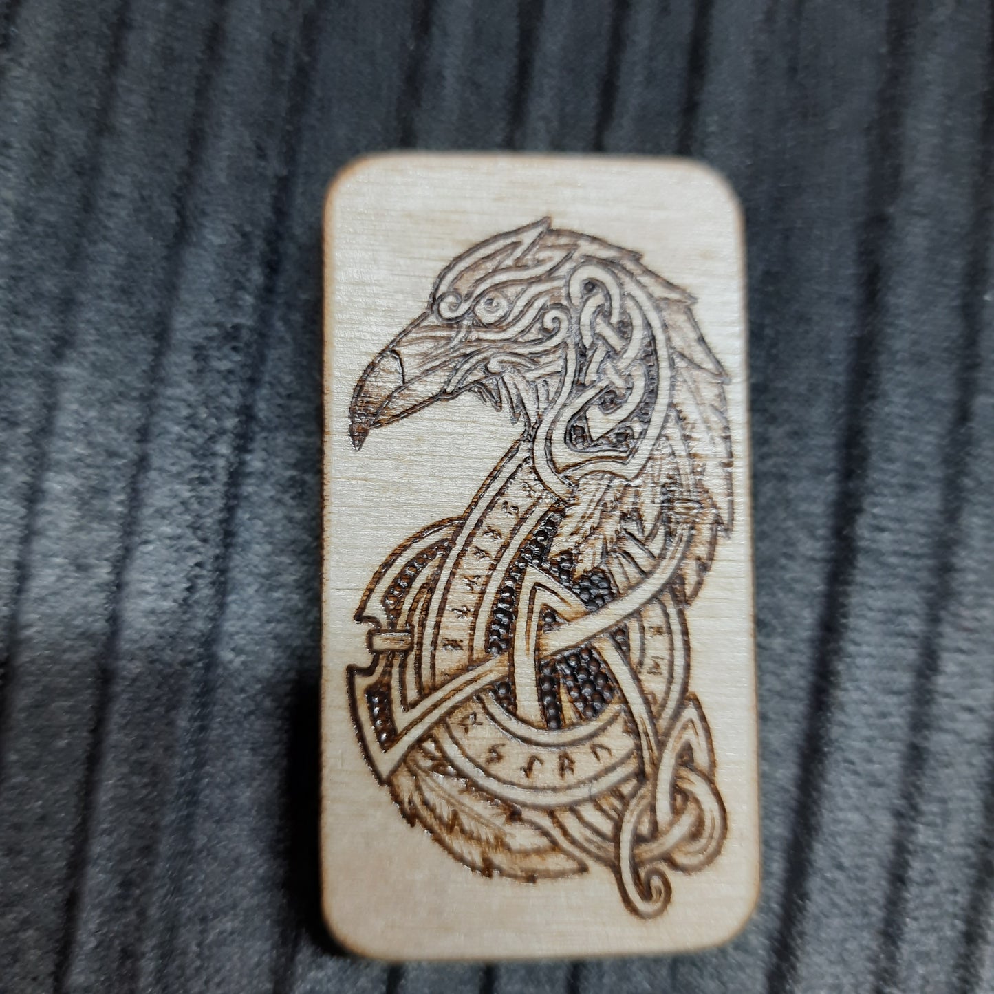 Wooden slider handmade "Raven and Shield"