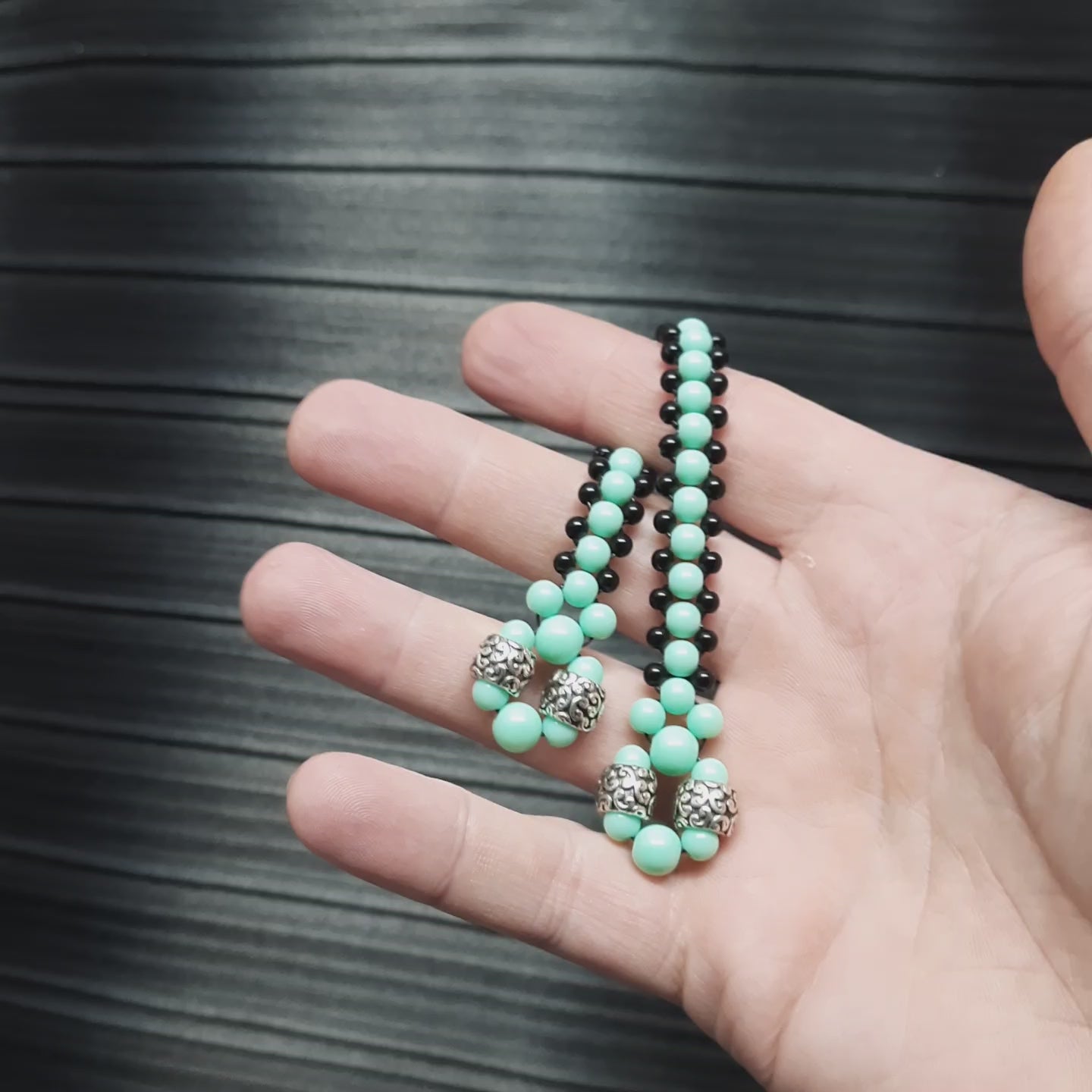 Handmade flip rosary (chetki), assembled from round plastic beads. The chotki has good flexibility thanks to the silicone cord. This fidget is used as an anti-stress, skill toy, stylish accessory and collectible.