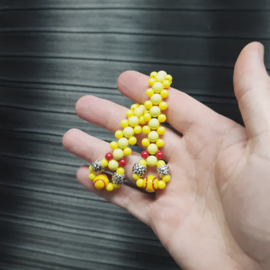 Handmade flip rosary (chetki), assembled from round plastic beads. The chotki has good flexibility thanks to the silicone cord. This fidget is used as an anti-stress, skill toy, stylish accessory and collectible.