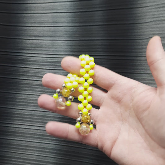 Handmade flip rosary (chetki), assembled from round plastic beads. The chotki has good flexibility thanks to the silicone cord. This fidget is used as an anti-stress, skill toy, stylish accessory and collectible.