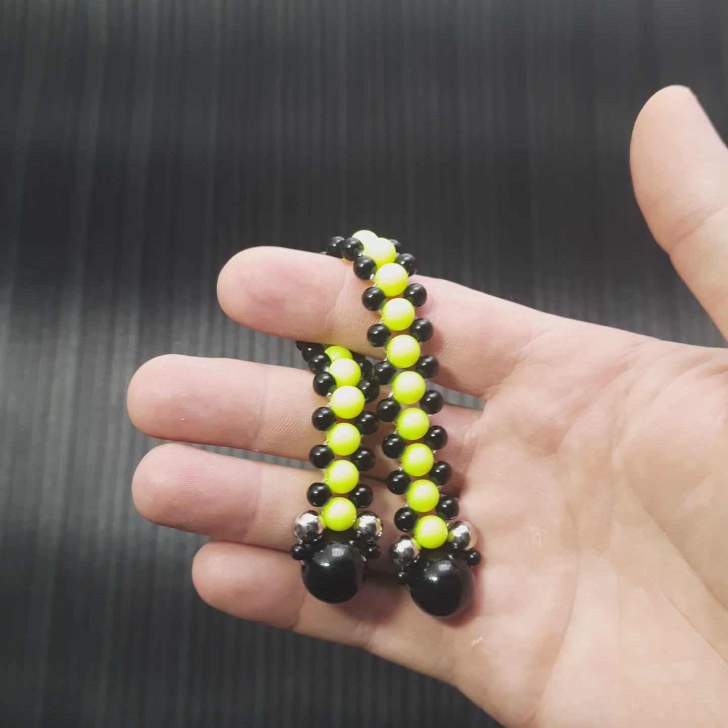 Handmade flip rosary (chetki), assembled from round plastic beads. The chotki has good flexibility thanks to the silicone cord. This fidget is used as an anti-stress, skill toy, stylish accessory and collectible.